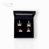Set of crown-shaped earrings in a black display box with 'Crowns & Regalia' branding.